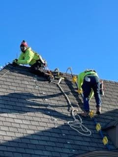 E.L.F. Designs crew installing holiday lights on a residential rooftop in Jarrettsville, Maryland